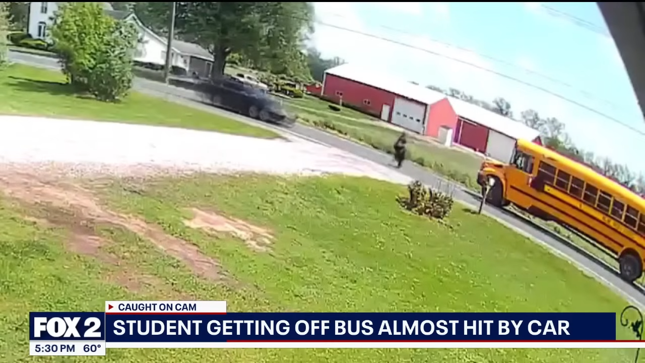 11 year old getting off bus almost hit