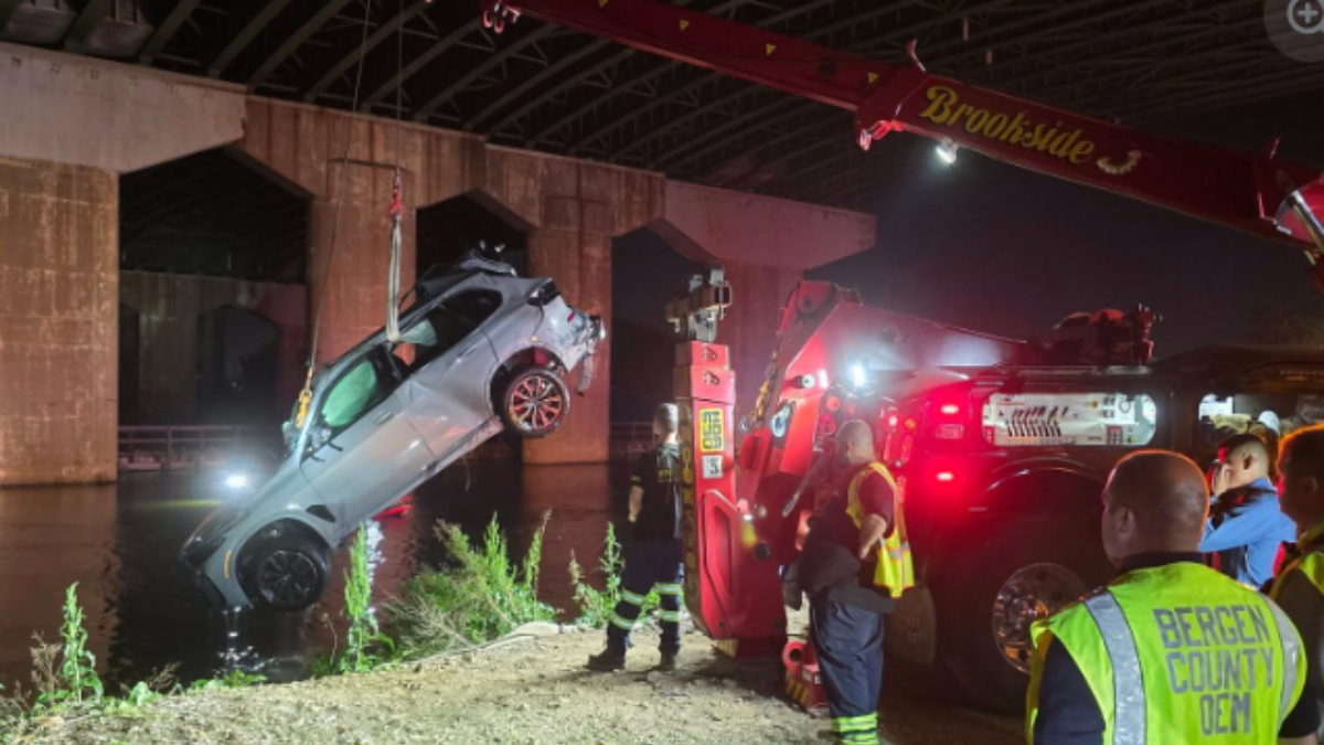 BMW Takes an Unexpected Swim After Highway Crash in New Jersey, Driver Found Hiding Under Train