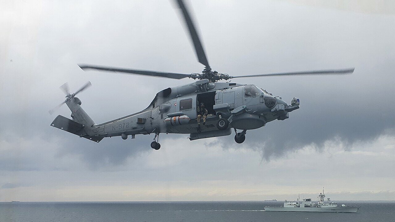 The embarked MH-60 Seahawk Helicopter (RAIDER) of Standing NATO Maritime Group One (SNMG1) ship HDMS Absalon participates in a Naval Gunnery Support (NGS) training serial in the Baltic Sea on June 12, 2021 during Exercise BALTOPS 50.