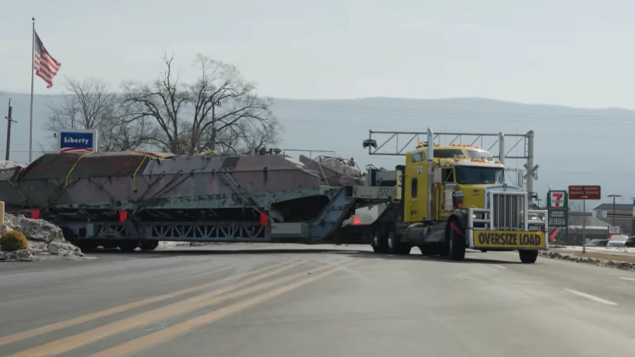 Truck transporting Mark V Special Operations Craft