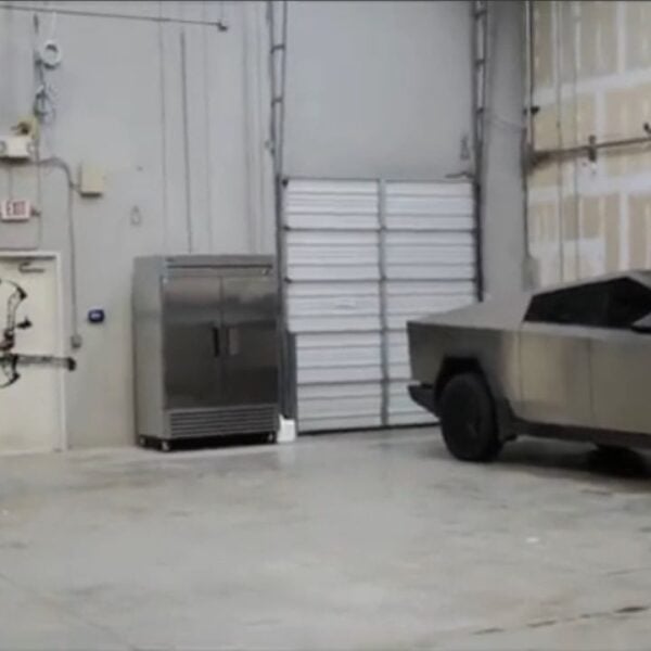 Watch an arrow explode on impact with Elon Musk's Cybertruck — and Musk barely flinch.