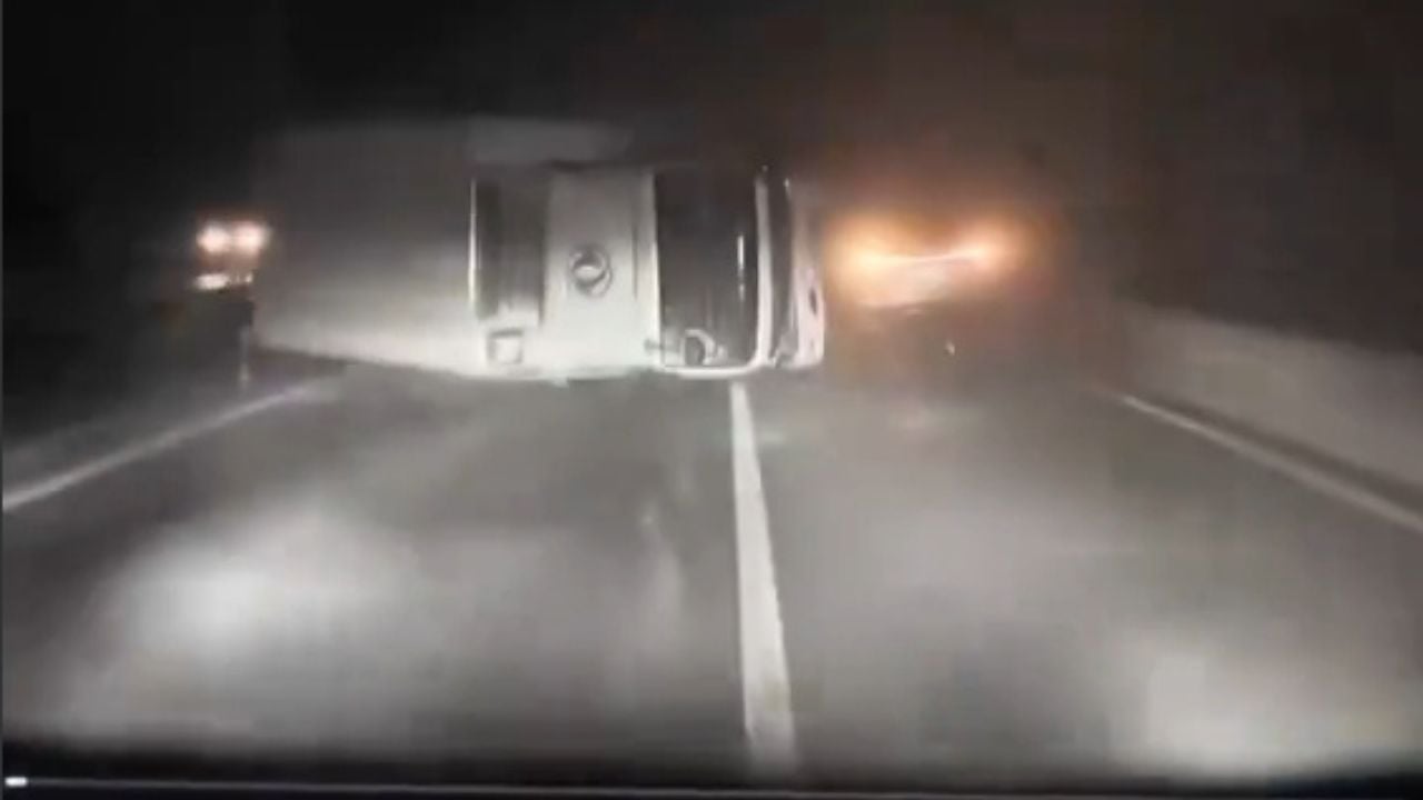 Watch the Tesla swerve around a wrecked sedan at the last second. Is this AI heroics — or a near-miss that shouldn't have happened?