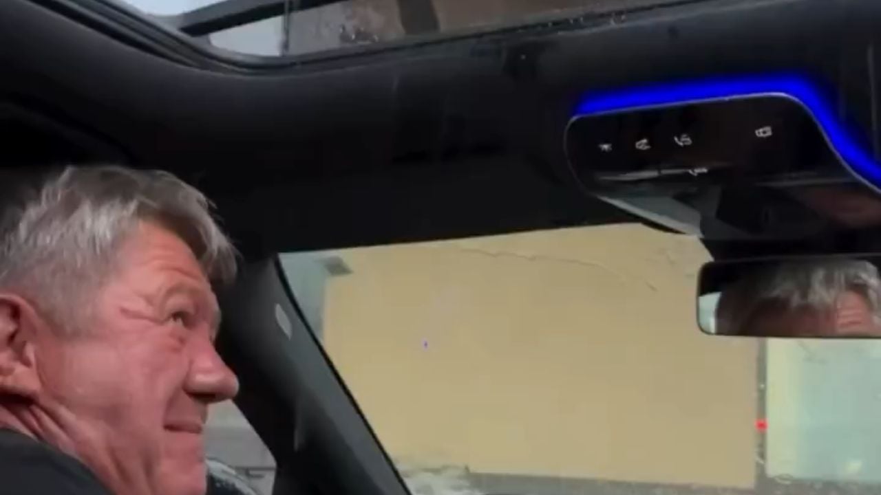 He told his Mercedes to 'open the roof' as a joke. The car wasn't laughing—but the rain sure was.