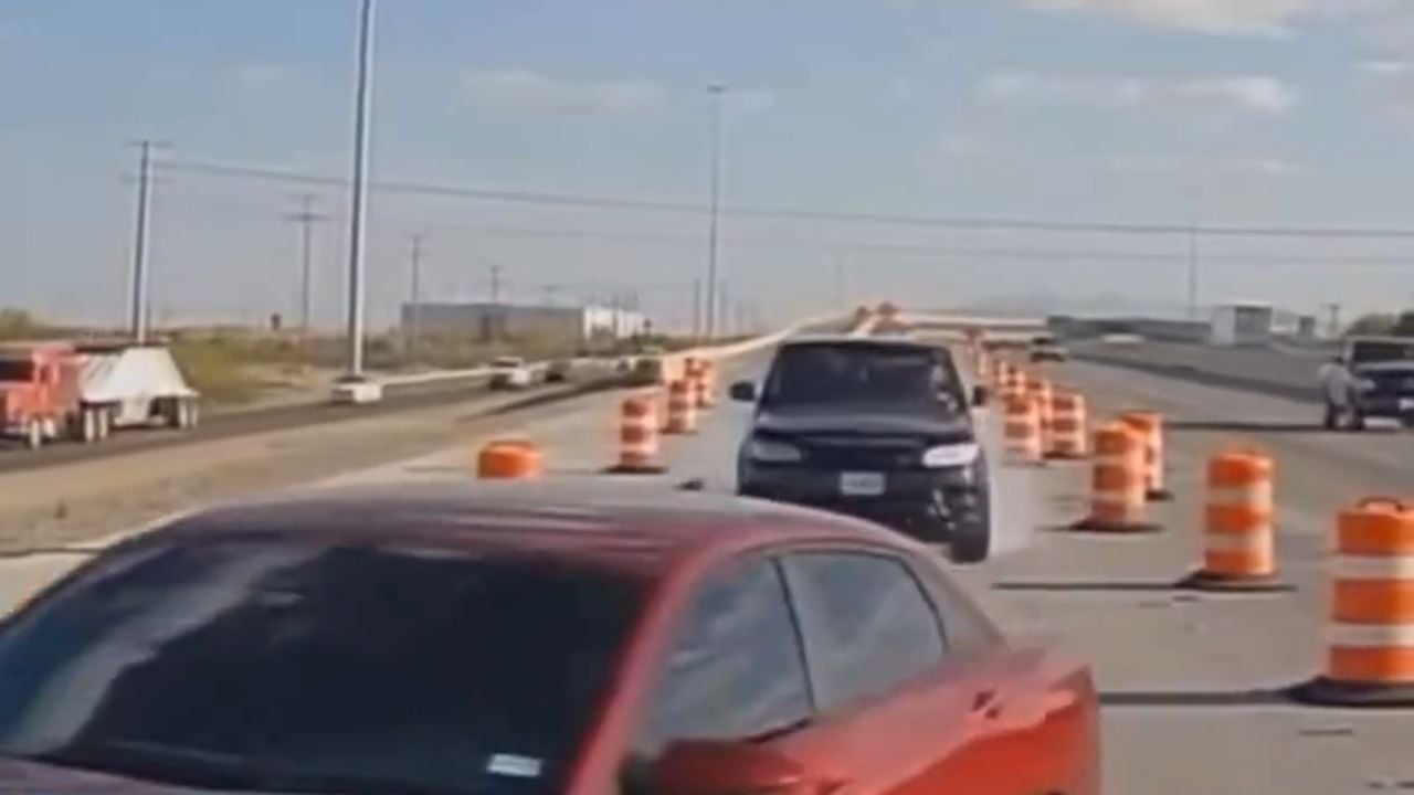 He was stopped in traffic. Then he looked in his rearview mirror.