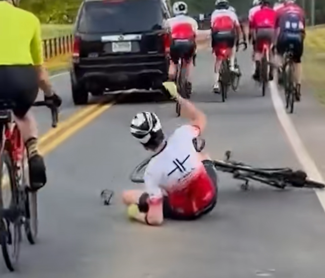 suv hits cyclist on road and drives off