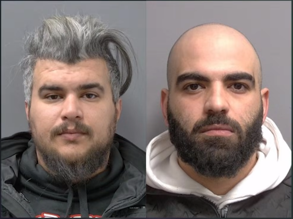 two arrested after two tow trucks hit