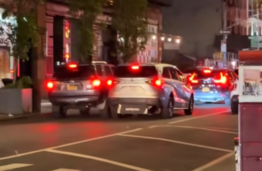 massive suvs battle at red light