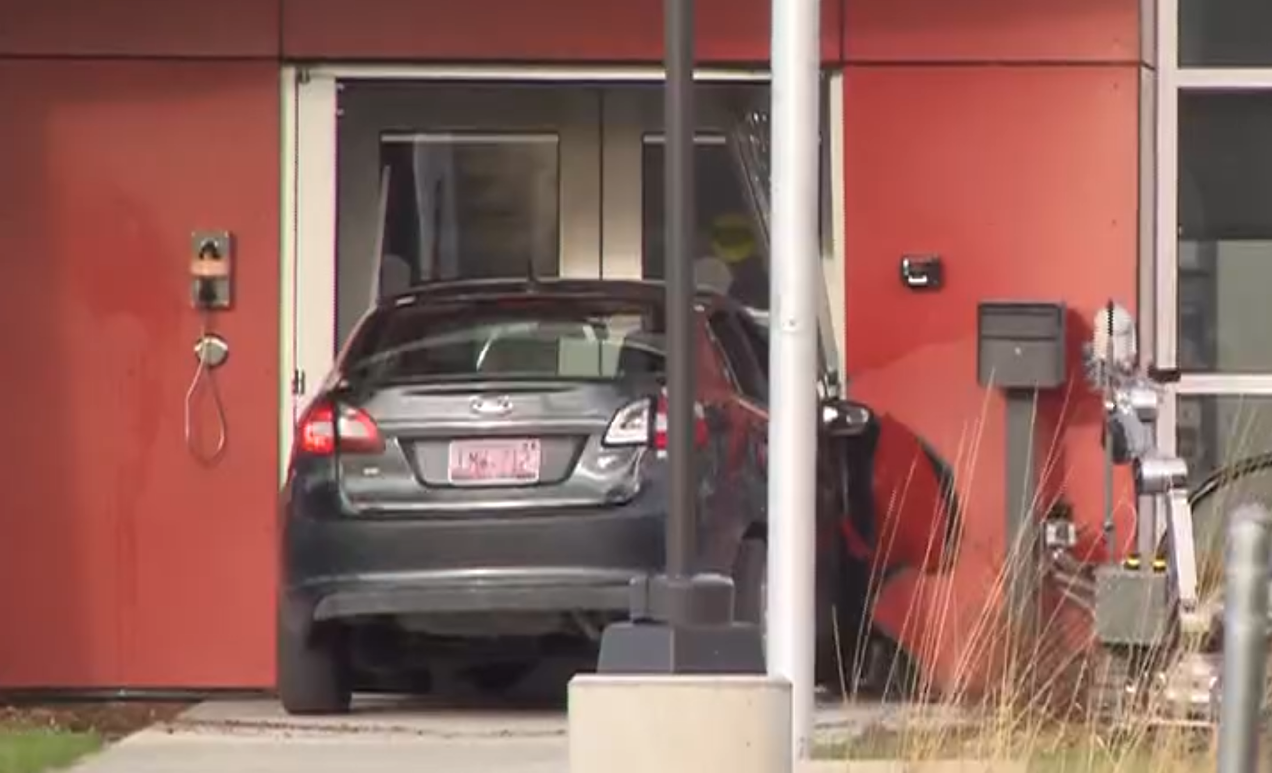 car rams into police station and uses bear spray