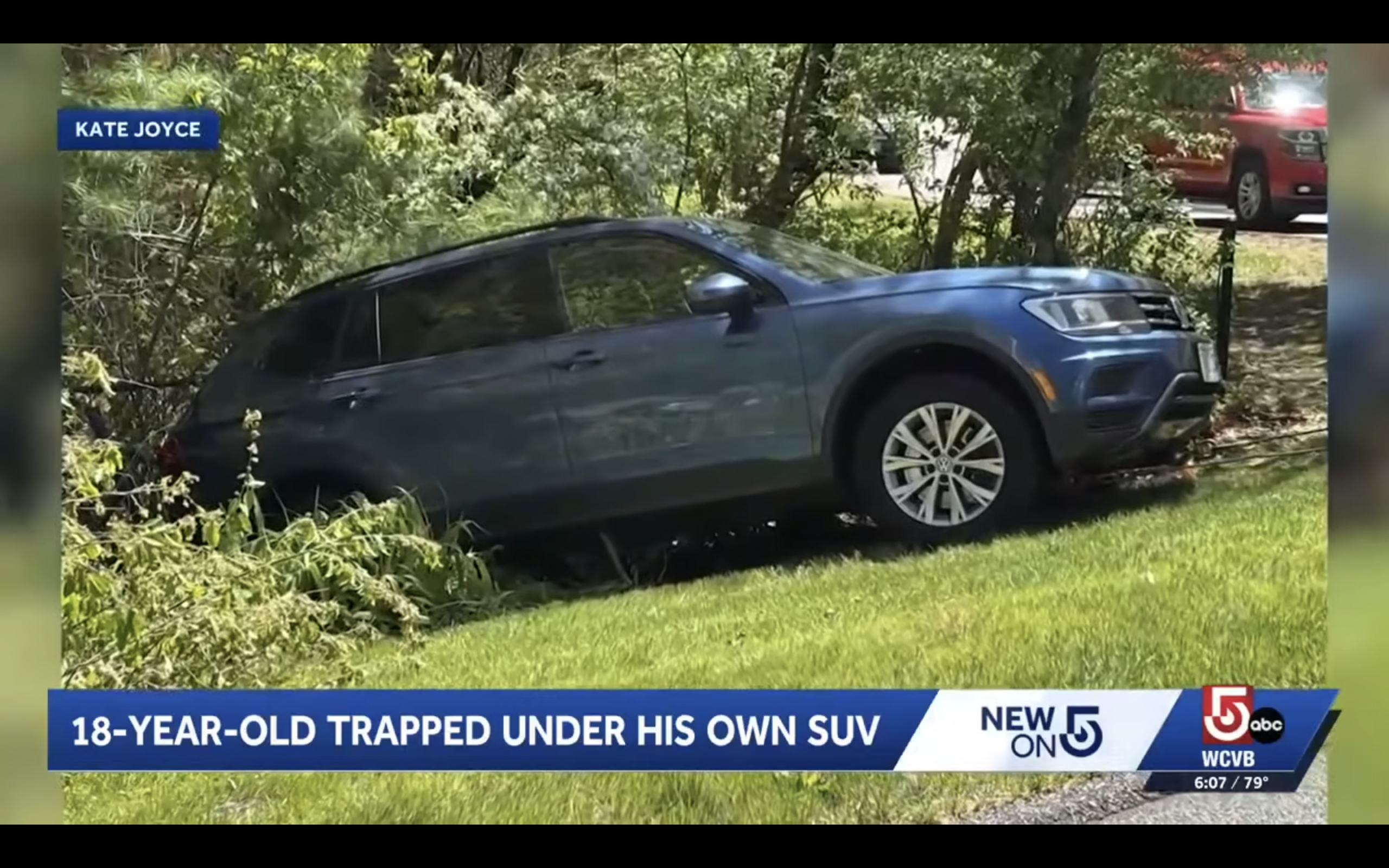 Man trapped under SUV
