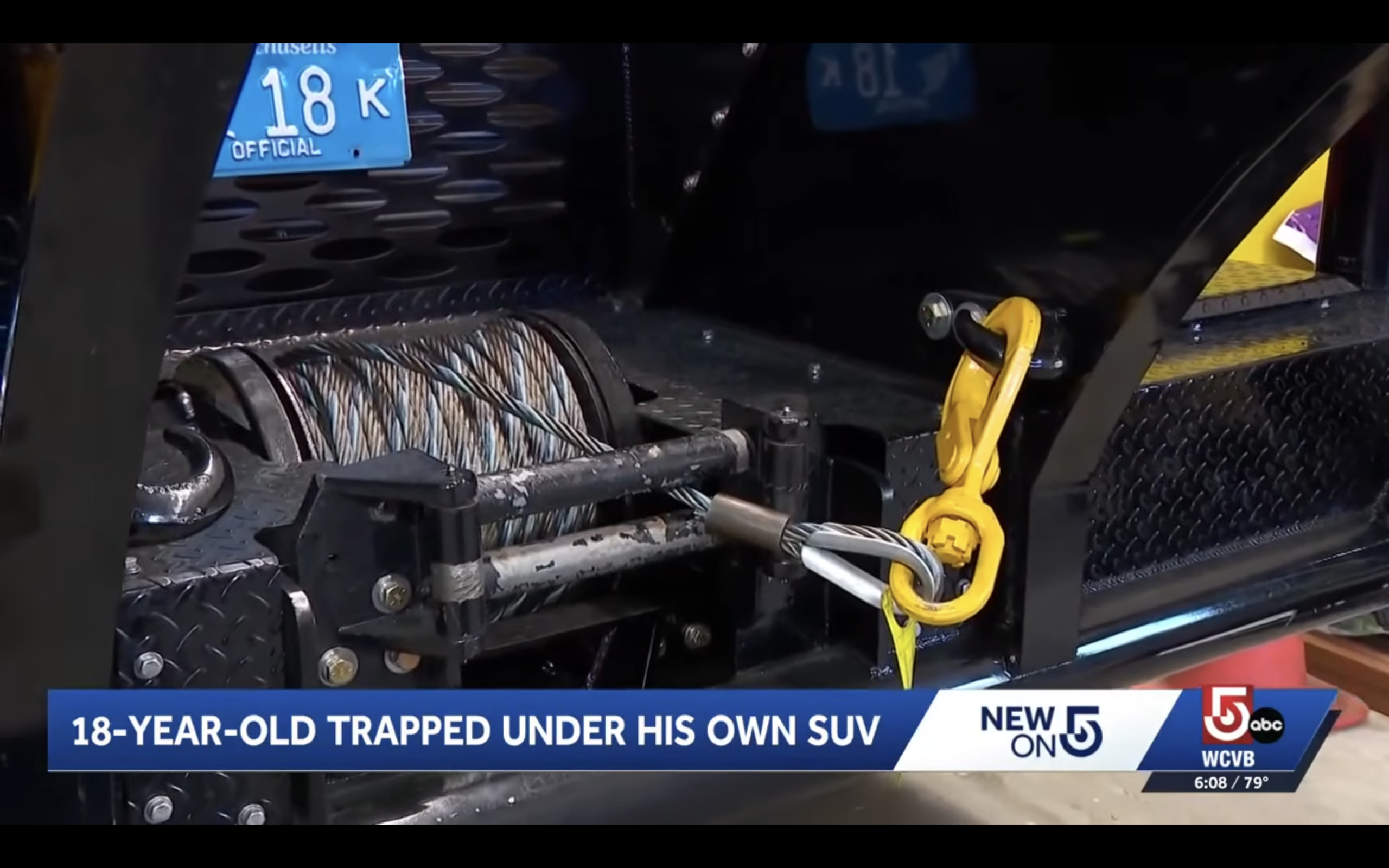 Man trapped under SUV