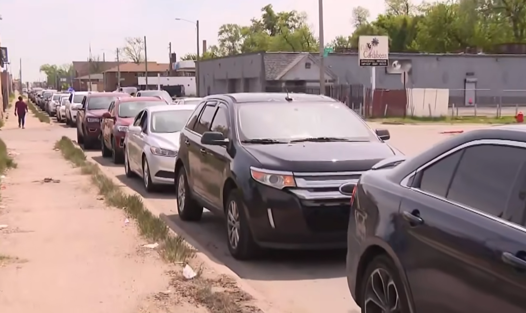 cars in line for free oil change in detroit