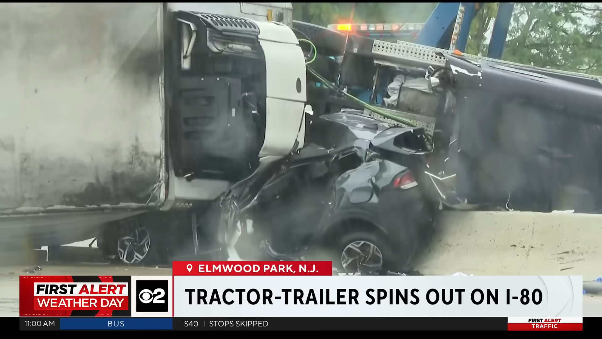 tractor trailer spins out and flips over