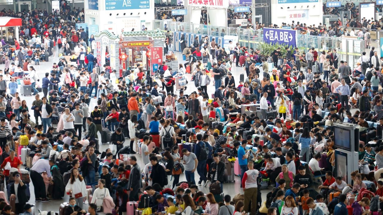 Crowds waiting at Guangzhou South Railway Station before Spring Festival travel in China