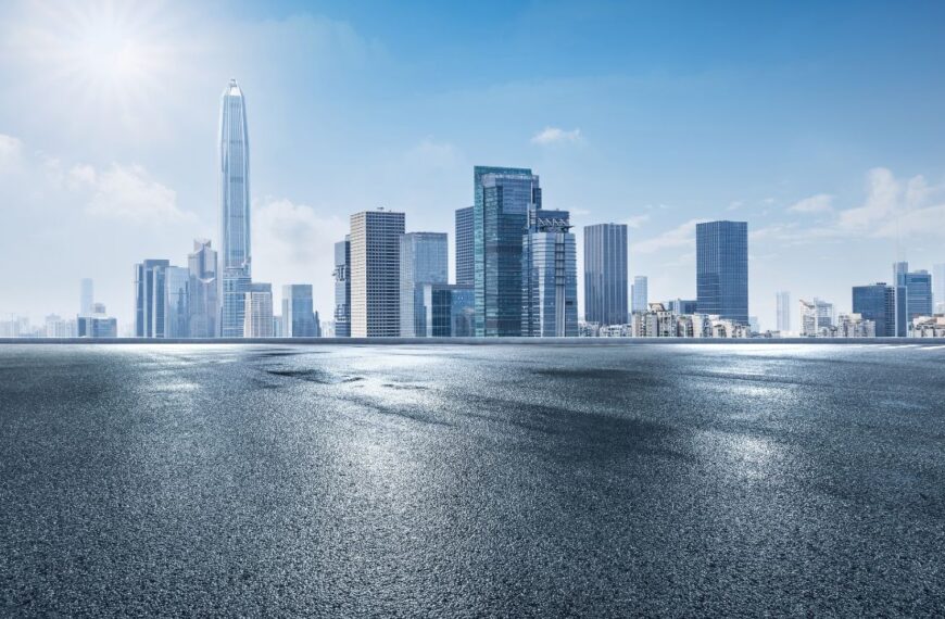 Asphalt road square with modern city buildings scenery in Shenzhen, China. Outdoor city background.