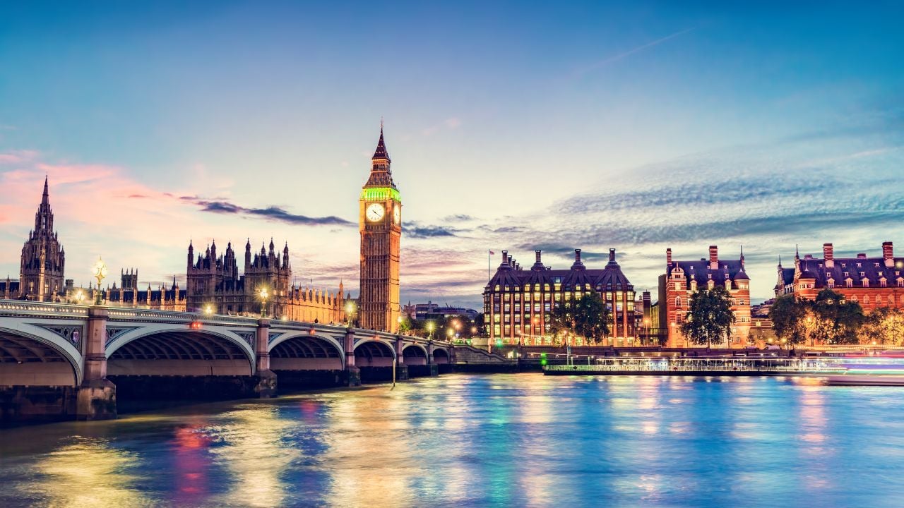 Big Ben, Westminster Bridge on River Thames in London, England, UK at night
