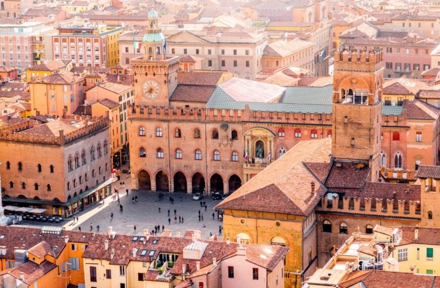 Aerial cityscape view from the tower on Bologna old town center with Maggiore square in Italy