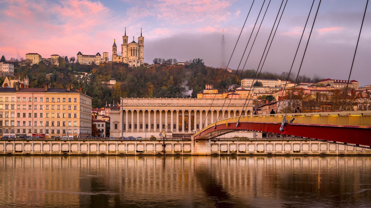 Pierre Truche pedestrian bridge over the Saône River with Fourvière hill in Lyon, France