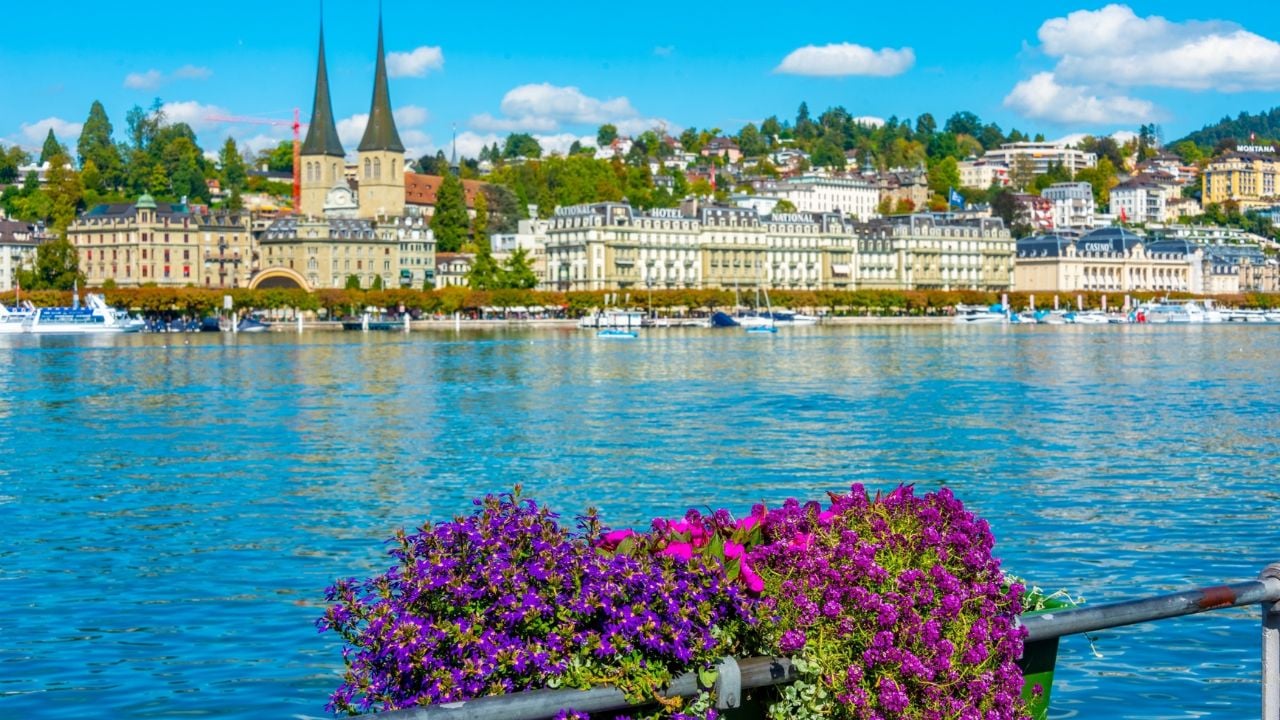 Waterfront of Lake Lucerne with a church in Lucerne, Switzerland.