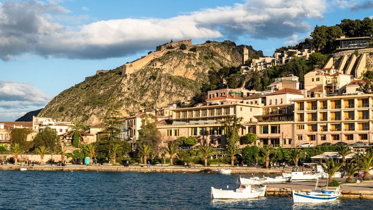 Late afternoon light on the Nafplio waterfront promenade and harbor in the Peloponnese, Greece