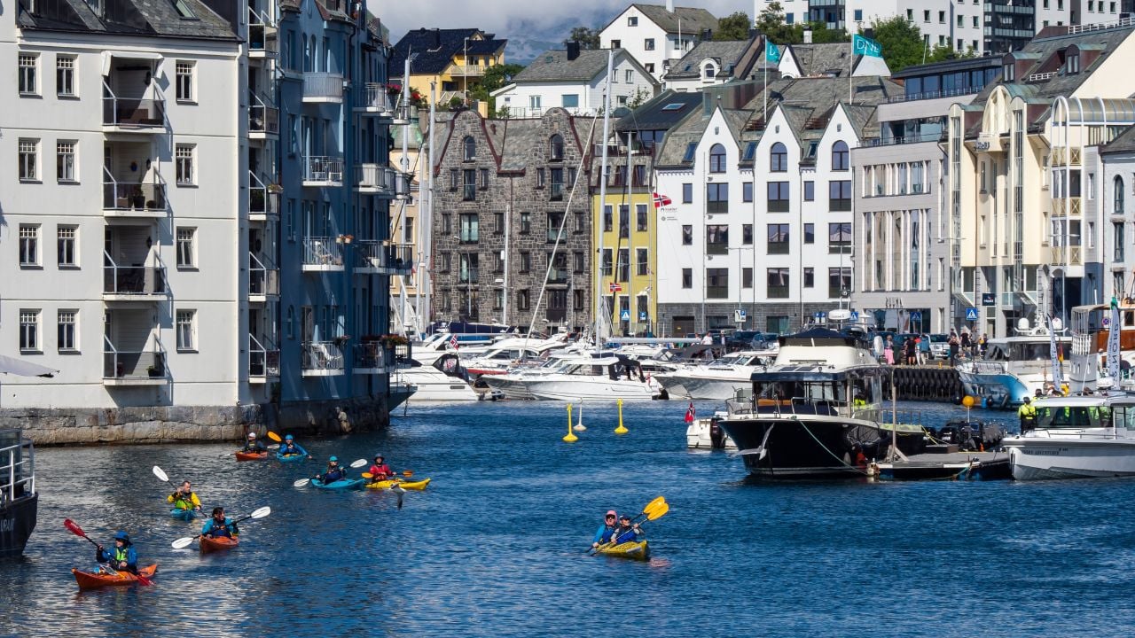 Canal and colorful buildings in Ålesund, Norway
