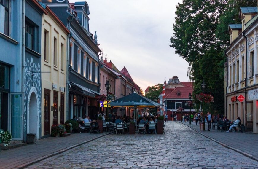 Kaunas, Lithuania - August 8, 2017: Paved street in Old town on a summer evening. Outdoor restaurant terrace. Famous travel destination