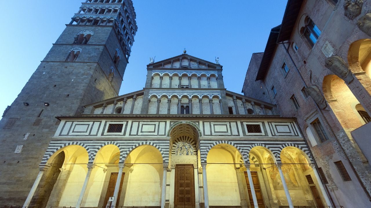 Facade of the medieval cathedral in Pistoia, Tuscany, Italy, in the evening