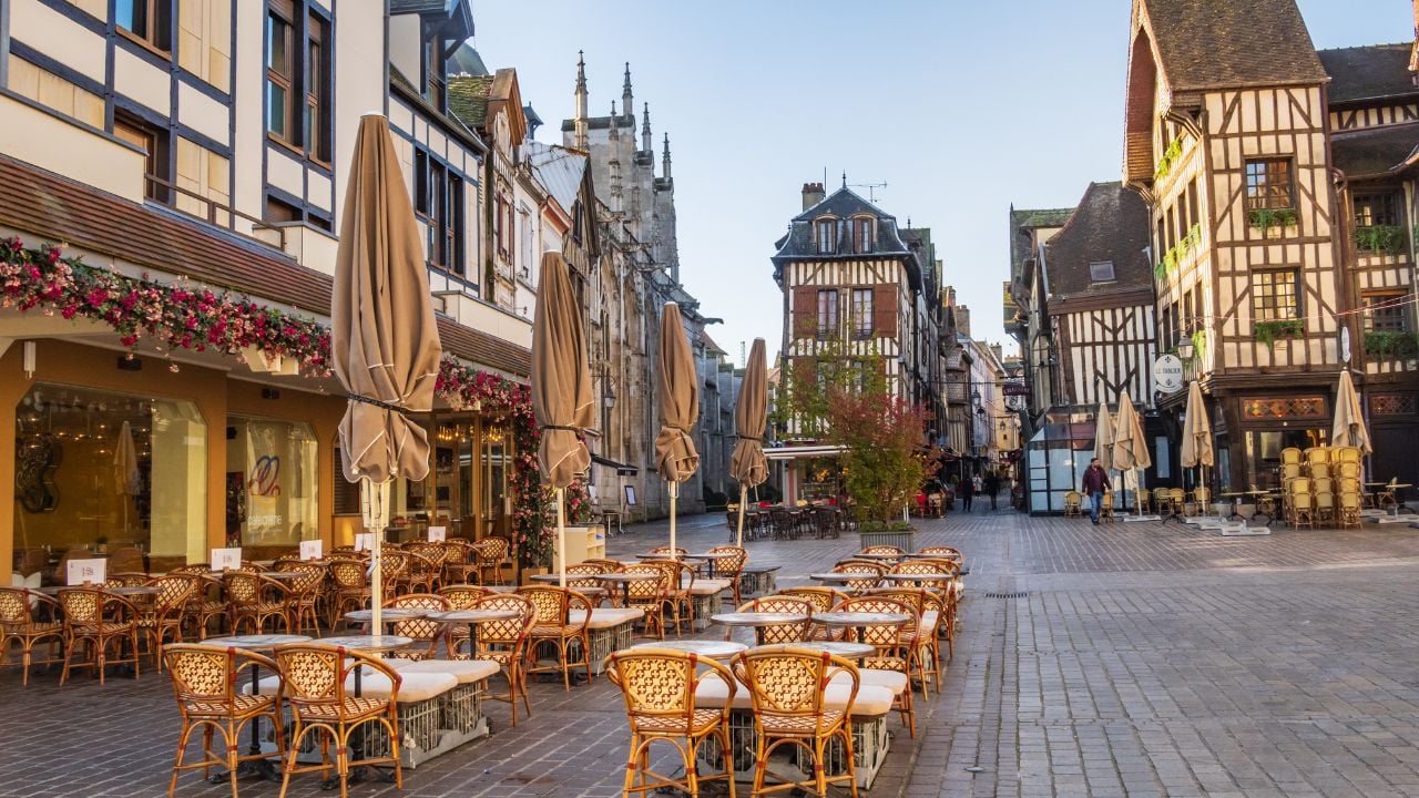 Restaurant terraces and half-timbered houses in Troyes, France