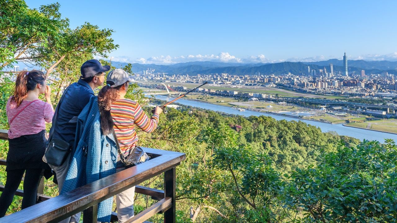 Taipei, Taiwan - Dec 18, 2016: Tourist watching Taipei city at observation platform