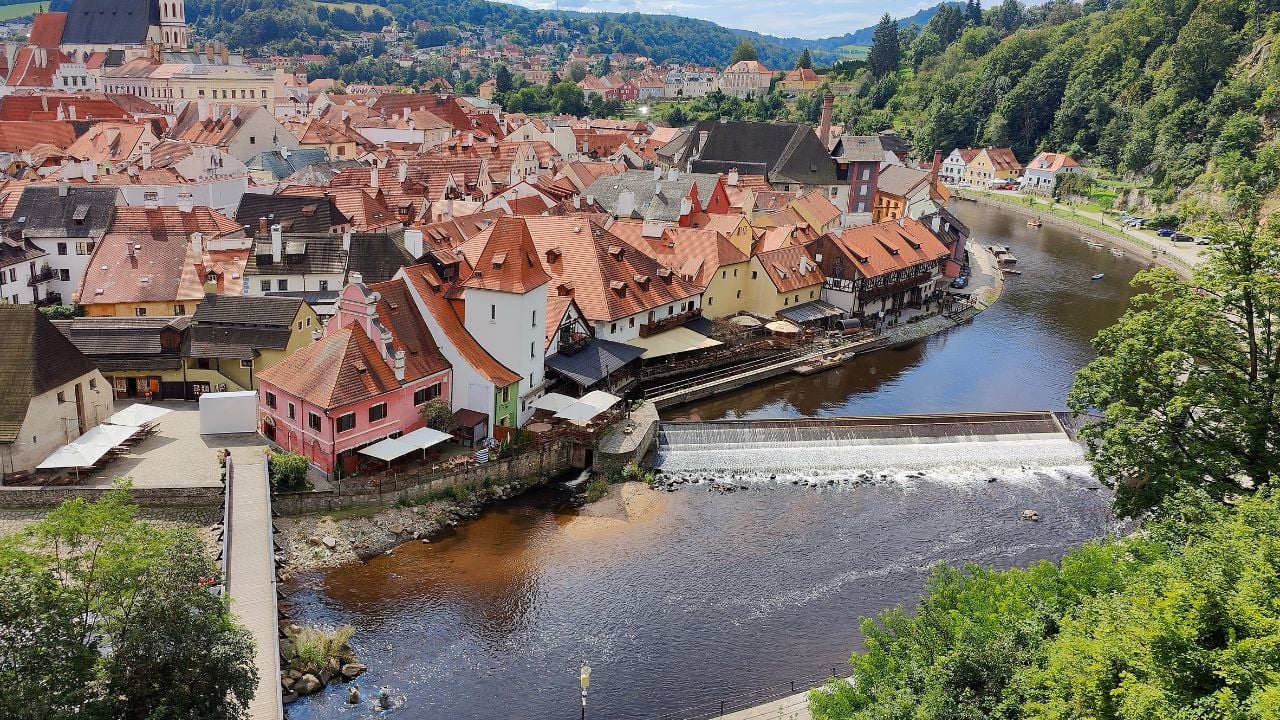 Historic town of Český Krumlov with red roofs and the Vltava River