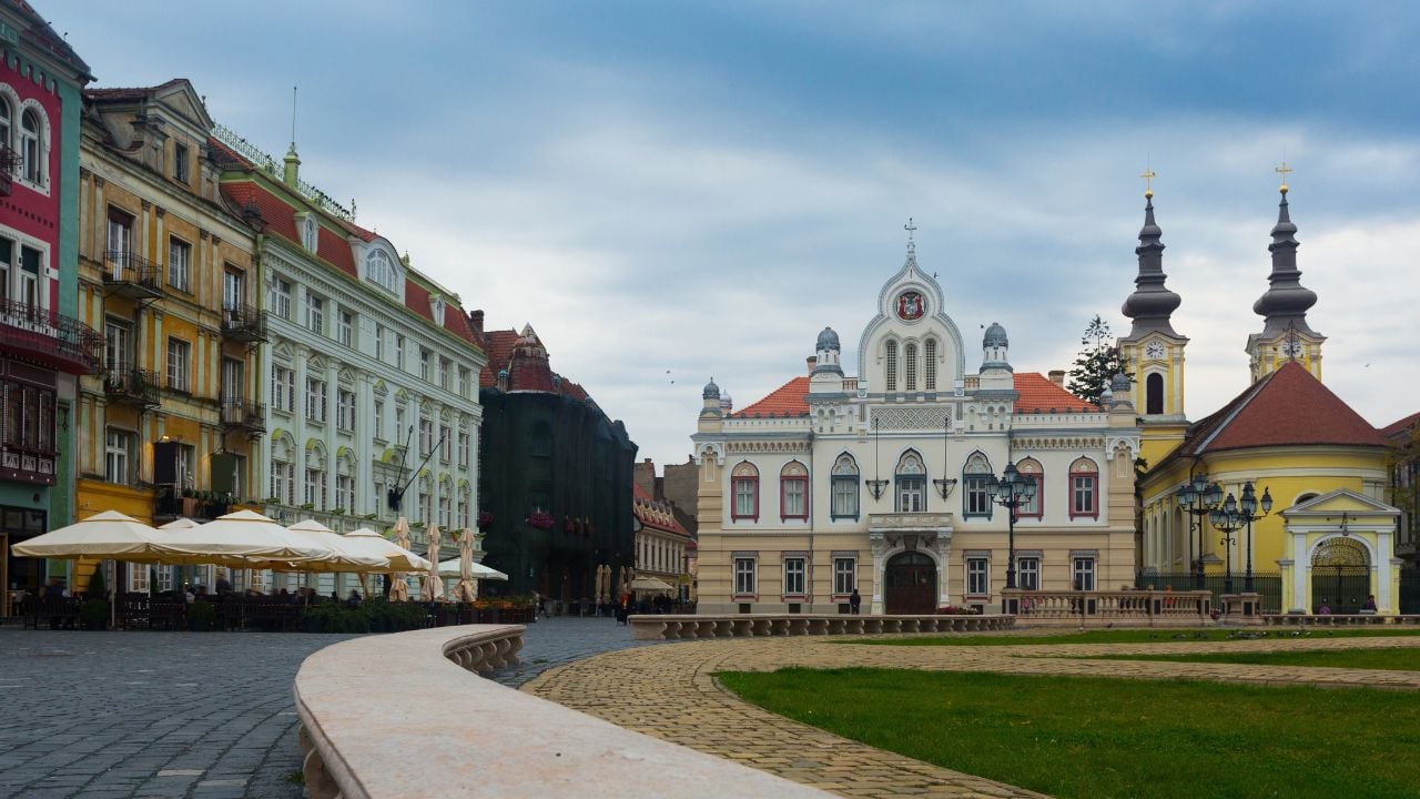 Picturesque colored architecture of Unirii Square in romanian town Timisoara