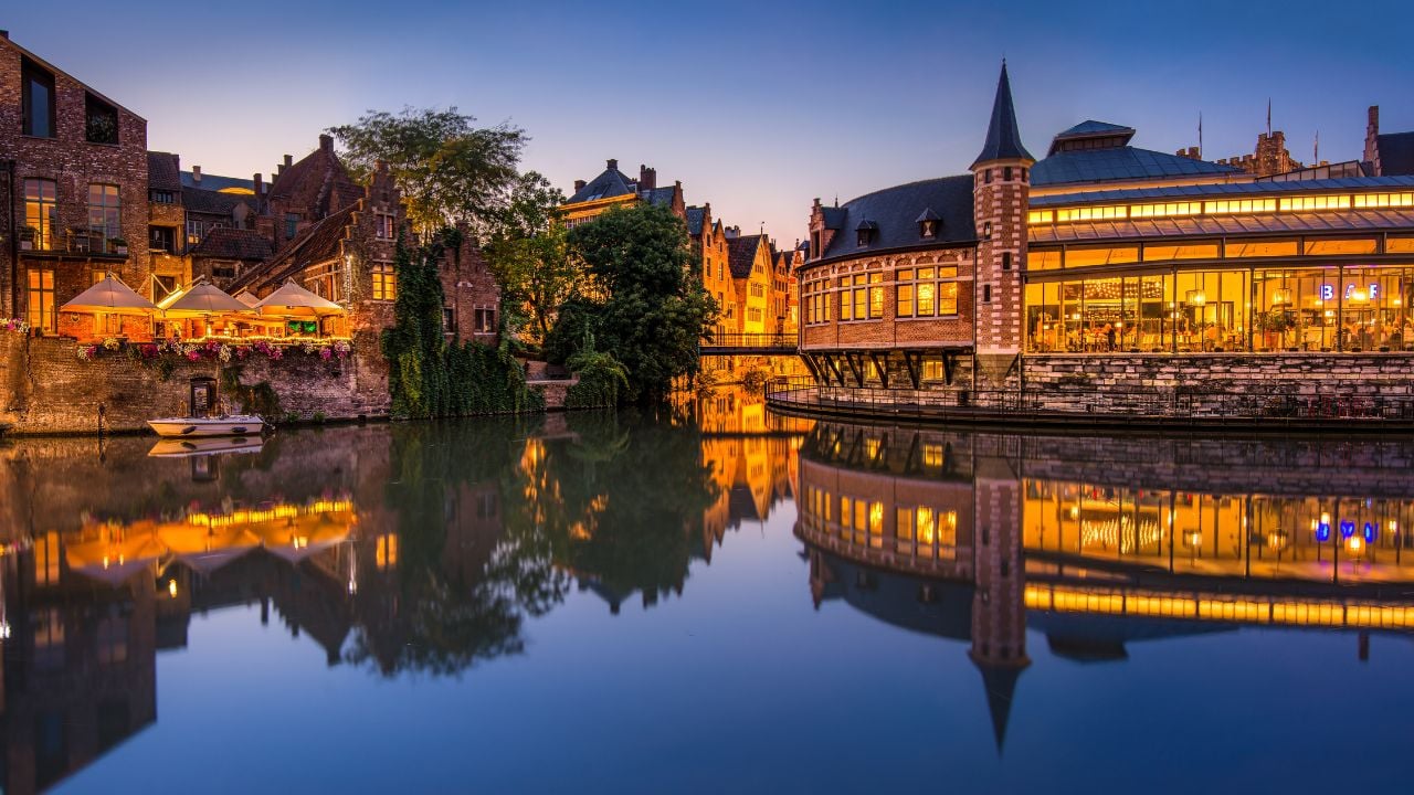 Evening reflection of a canal-side restaurant in Ghent, Belgium