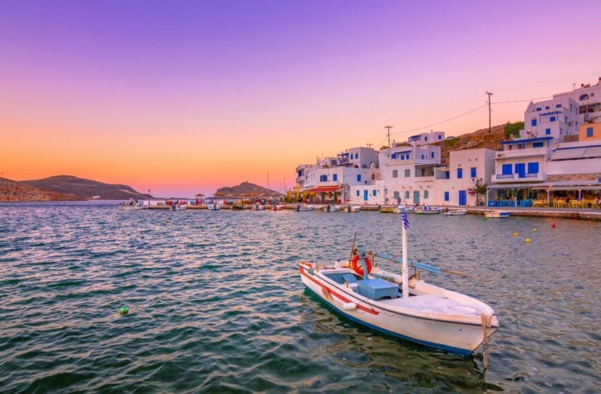 The small peaceful old harbor of picturesque Panormos at sunset, Tinos island, Greece.