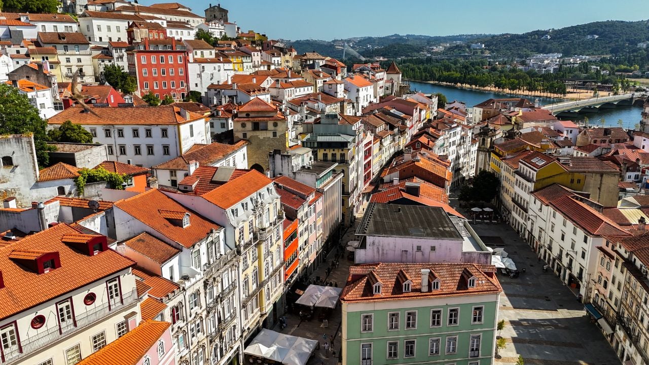 Aerial view of Coimbra, Portugal, with the university, river, rooftops, and historic center