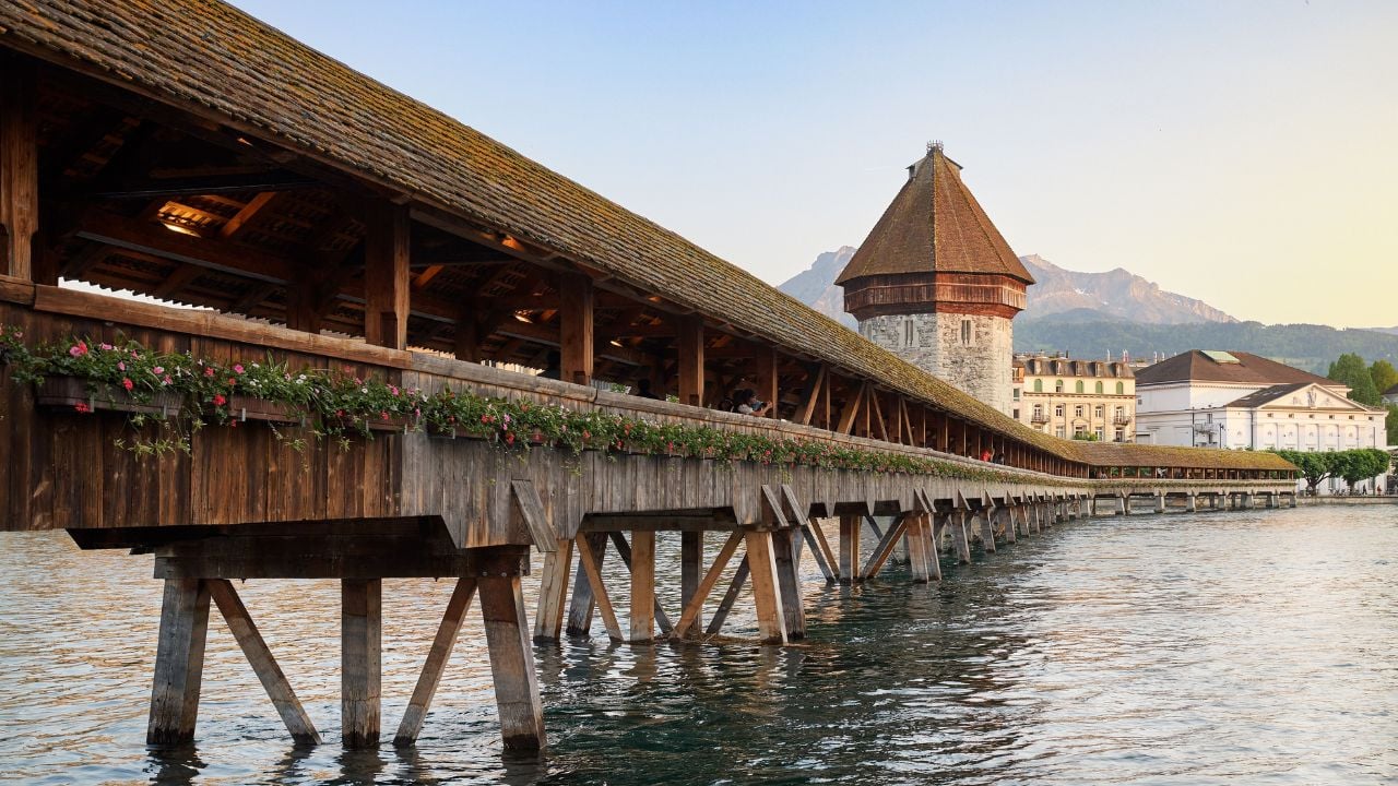 A scenic view of the iconic Chapel Bridge in Lucerne, Switzerland