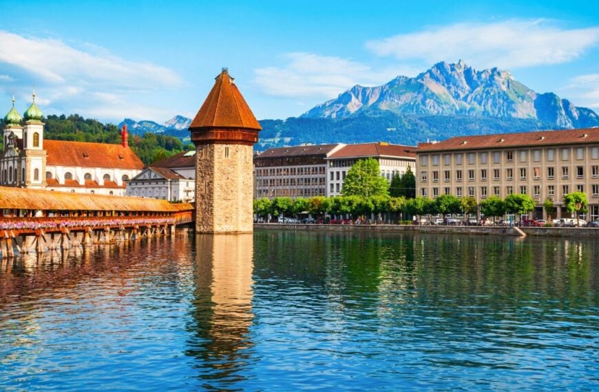 Kapellbrucke or Chapel Bridge is a wooden footbridge spanning Reuss river and Wasserturm water tower in Lucerne city, central Switzerland