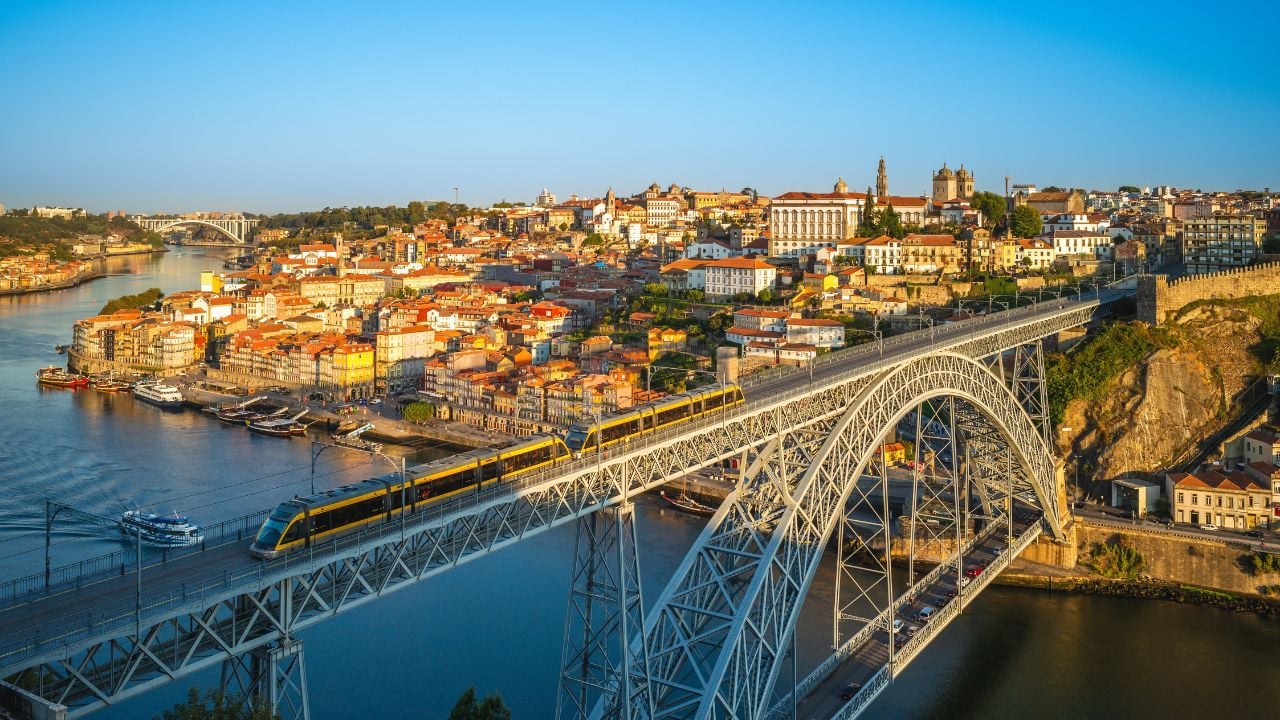 Dom Luís I Bridge over the Douro River in Porto, Portugal, at dusk