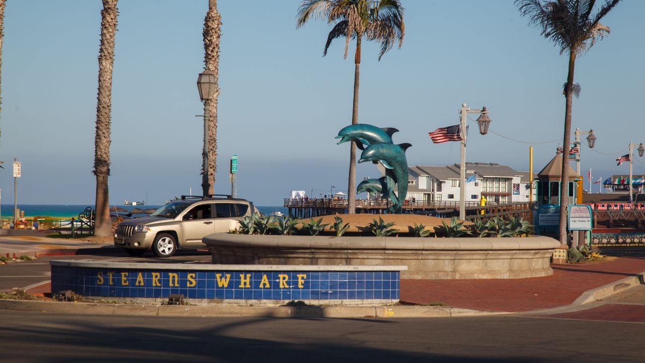 Santa Barbara, California, United States - September, 17th, 2016: The Dolphins monument in Stearns Wharf pier at the beach and the pacific ocean in Santa Barbara, California, United States
