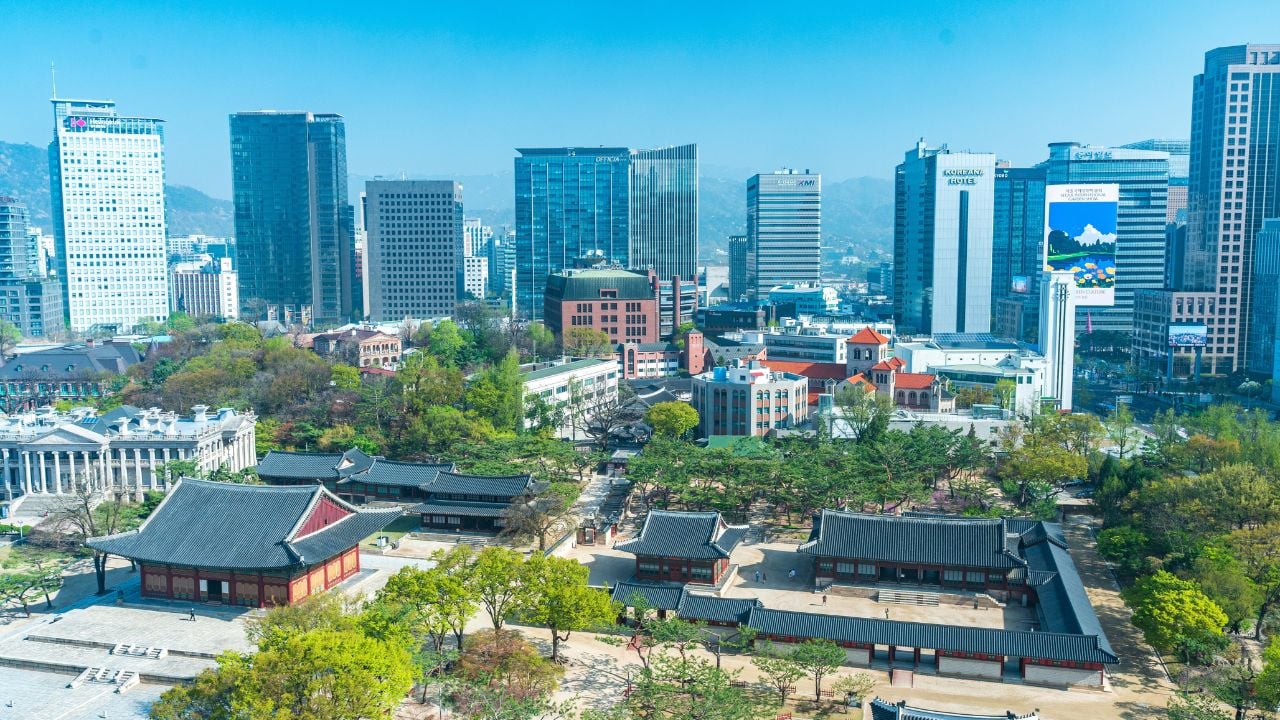 Seoul, South Korea - Apr. 12 , 2026 : Aerial view of Deoksugung Palace with modern skyscrapers in Seoul, South Korea