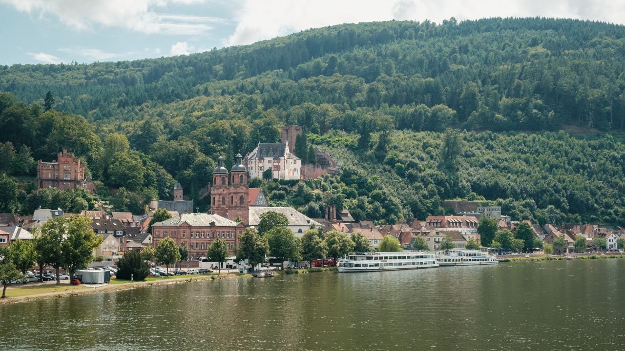 Miltenberg, Bavaria, Germany - 11.07.2024: View of the old town of Miltenberg on the banks of the River Main in summer