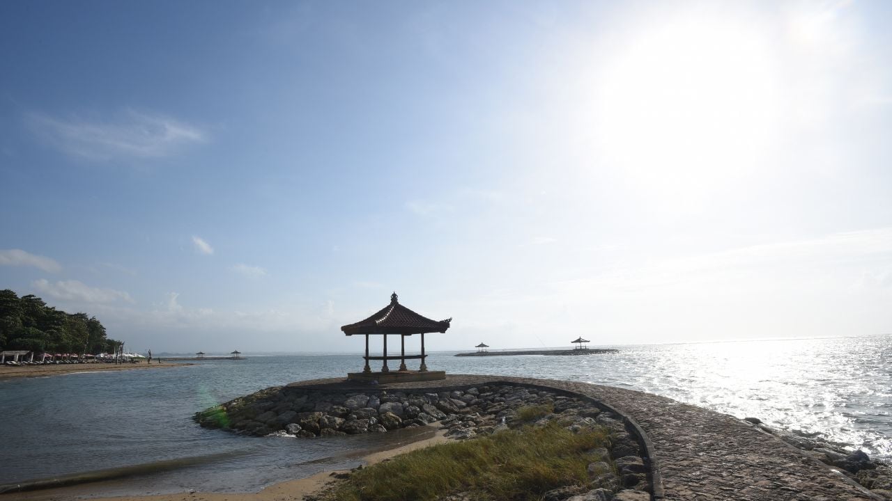 Sanur beach and Mount Agung volcano at sunrise, Bali, Indonesia.