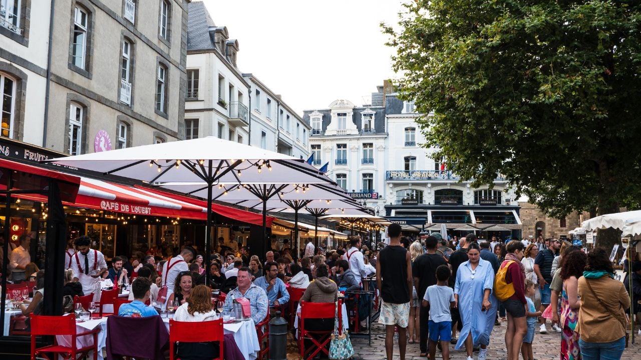 Busy restaurant terraces in Saint-Malo, France.