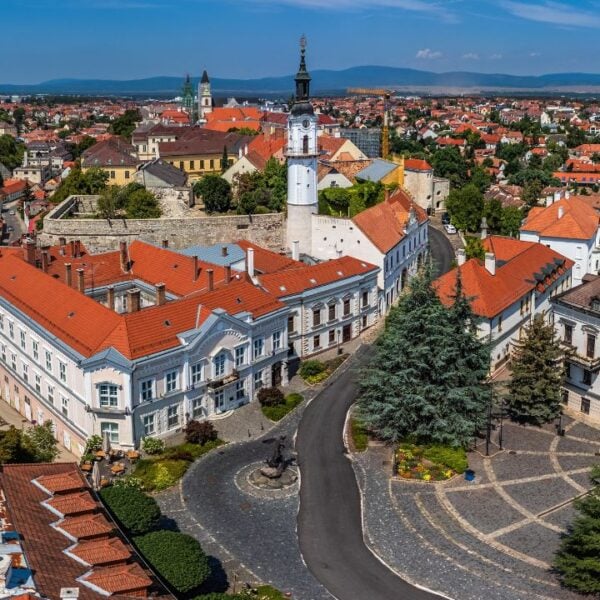 Veszprem, Hungary - Aerial panoramic view of the castle district of Veszprem with city hall building at Ovaros square and Fire-watch tower on a bright summer day with clear blue sky