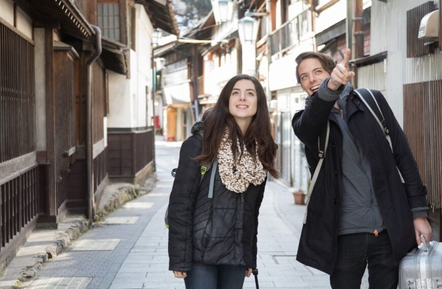 A couple traveling abroad to a famous hot spring resort in Japan