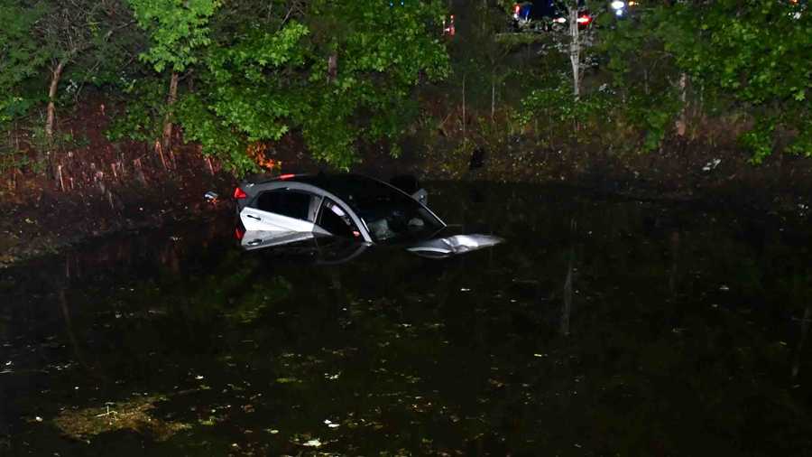 car falling into lake