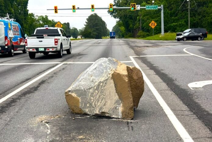 truck drops massive rock on highway in virginia