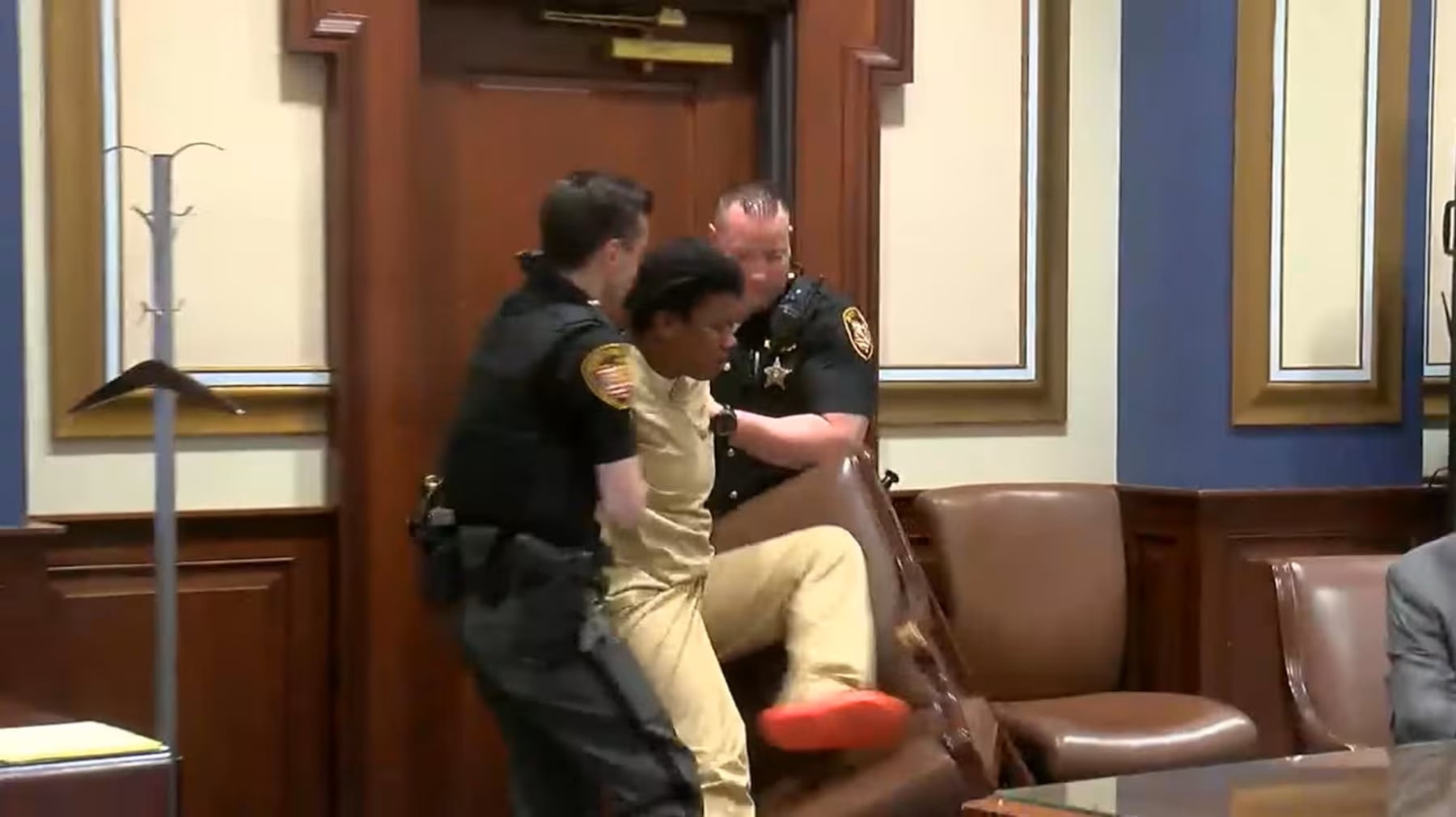police chase woman removed from court room