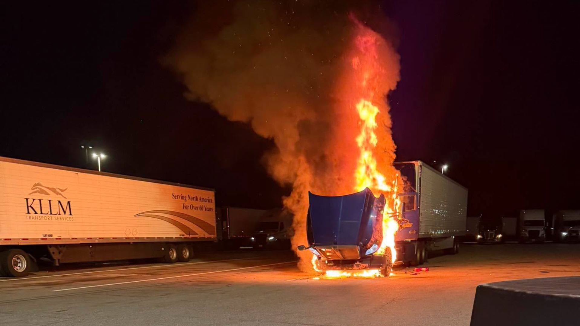 Picture of tractor‑trailer fire at Maine Turnpike plaza