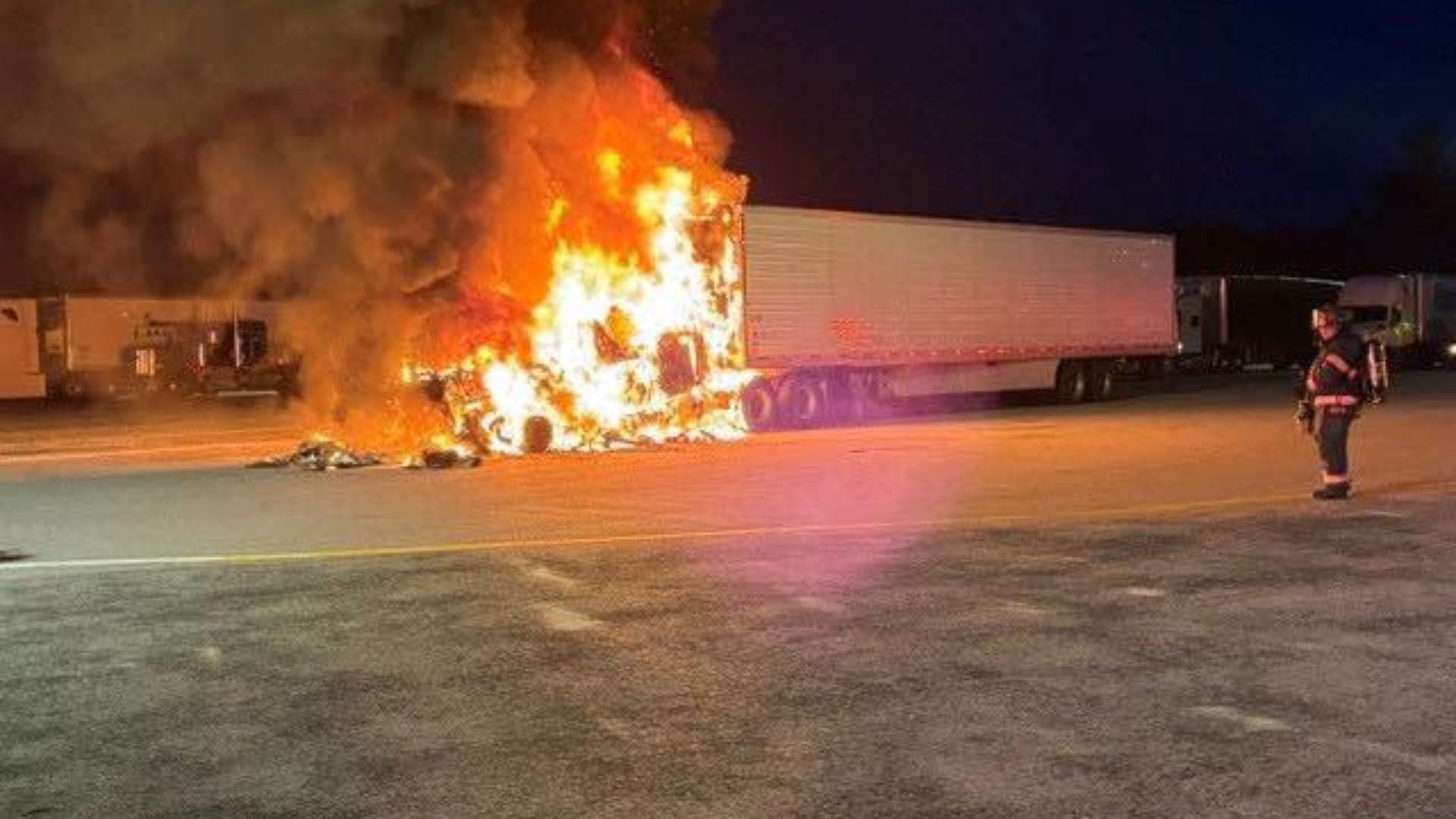 Picture of tractor‑trailer fire at Maine Turnpike plaza