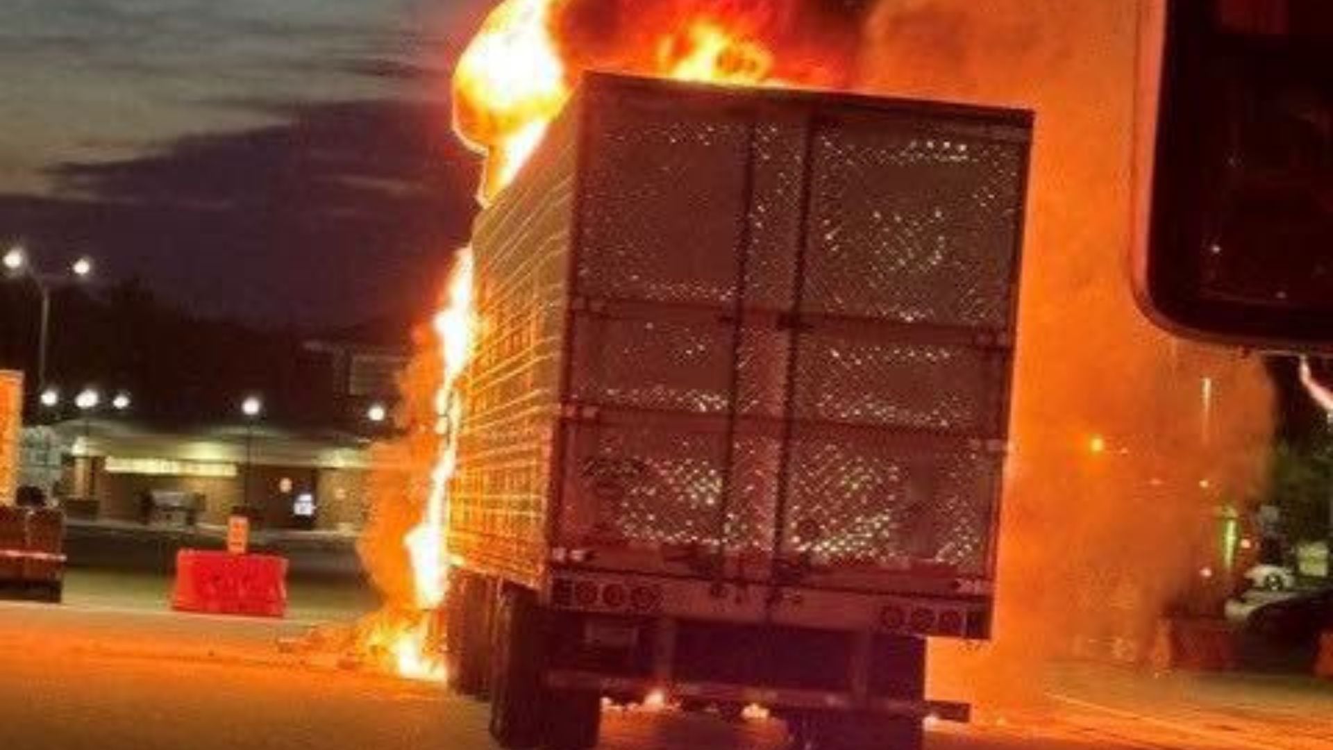 Picture of tractor‑trailer fire at Maine Turnpike plaza