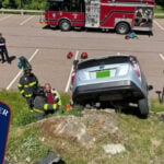 Car drives over edge of small cliff in Colchester parking lot